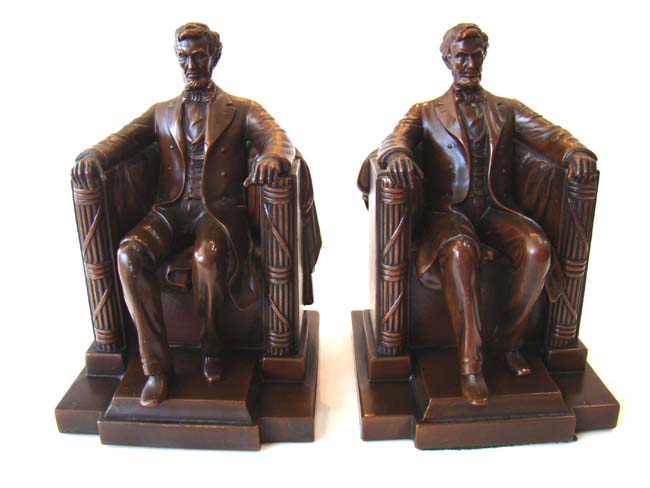 A fine pair of "Lincoln in the chair" bronze finished bookends made by Jennings Brothers circa 1925